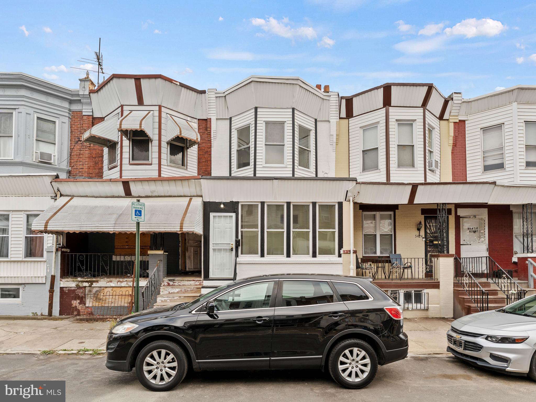 a car parked in front of a building