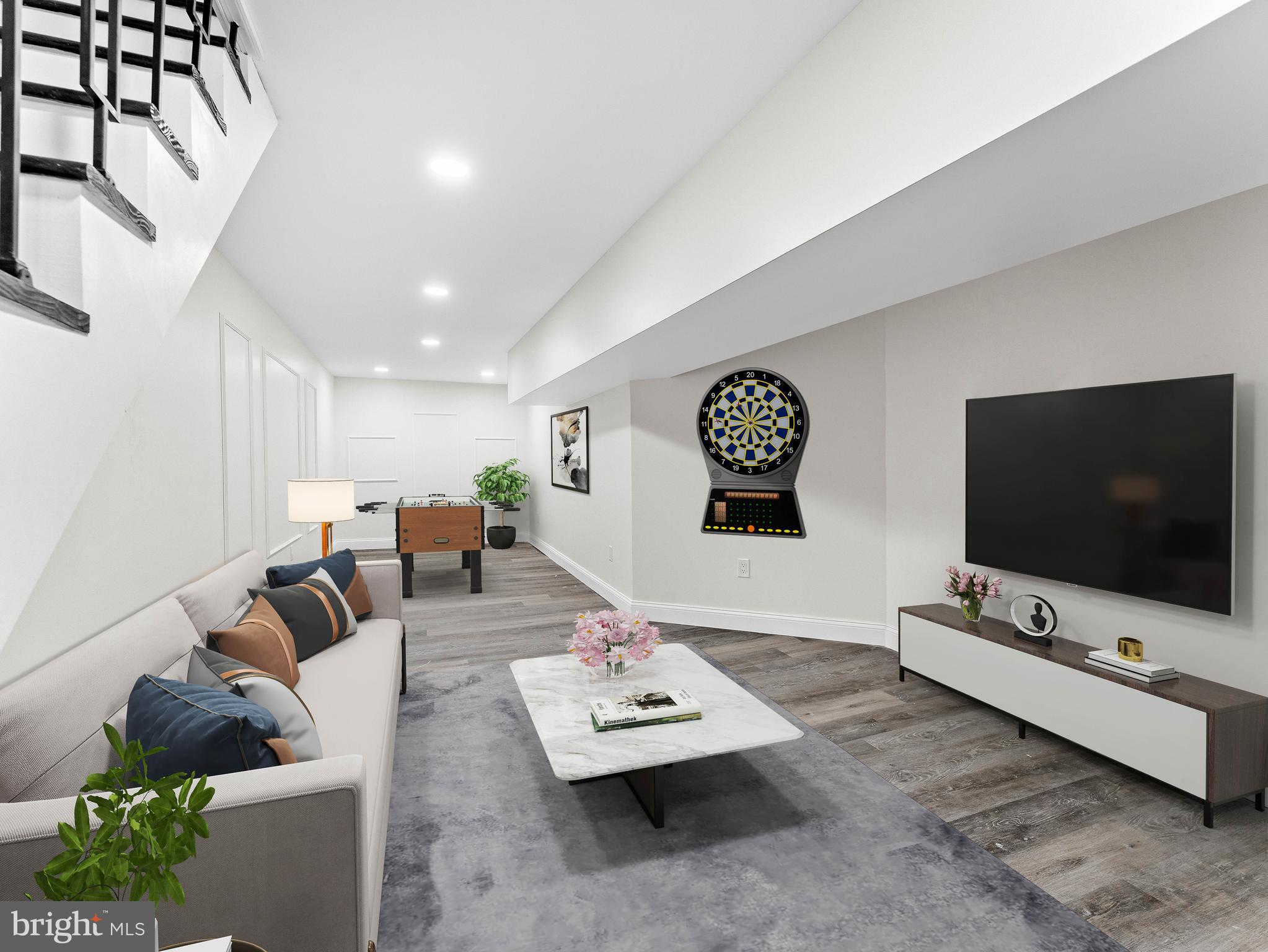 5422 Regent Street Philadelphia, PA 19143 - Photo 28 of 35 a living room with furniture and a flat screen tv