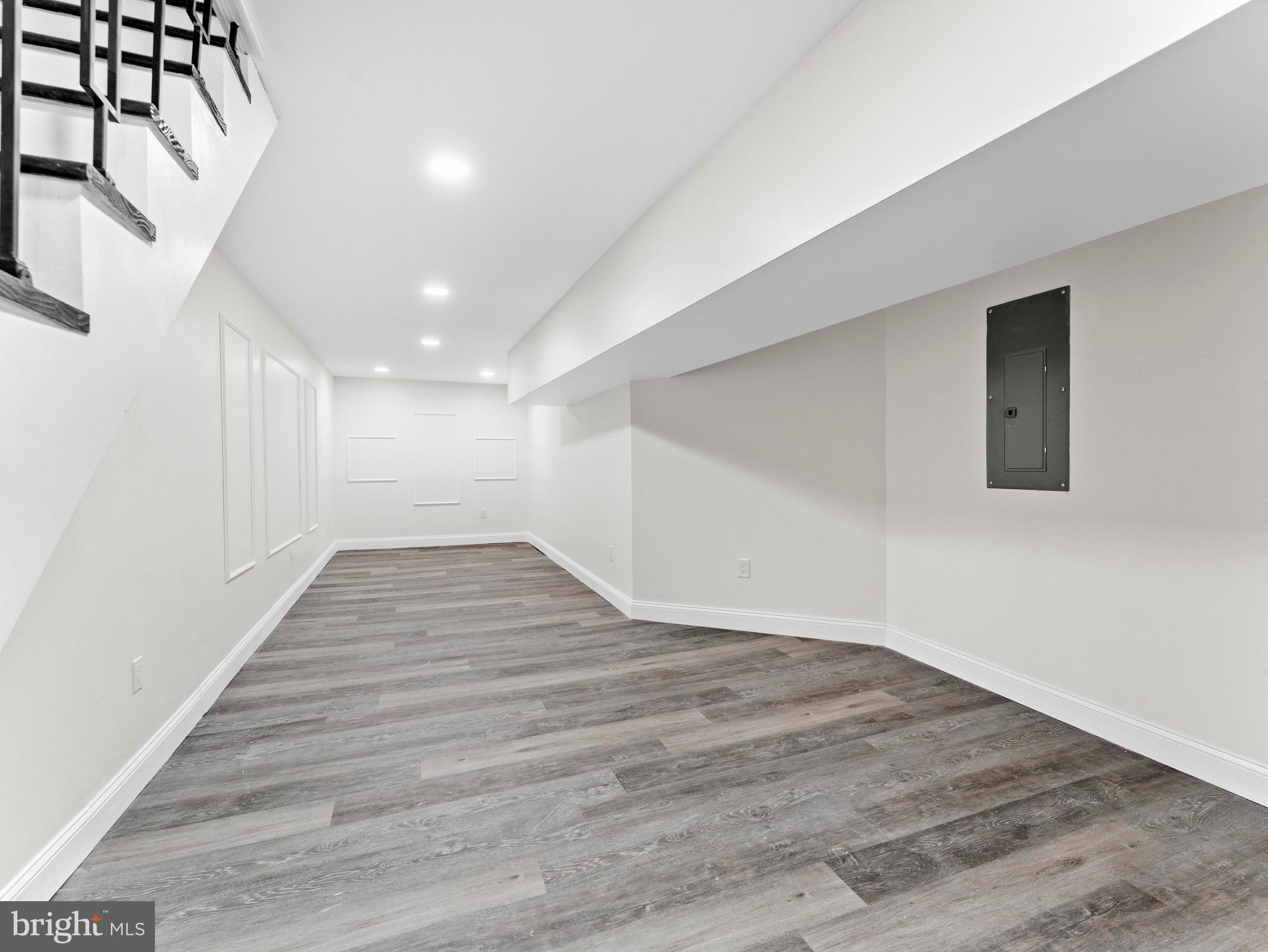 5422 Regent Street Philadelphia, PA 19143 - Photo 29 of 35 a view of an empty room with wooden floor