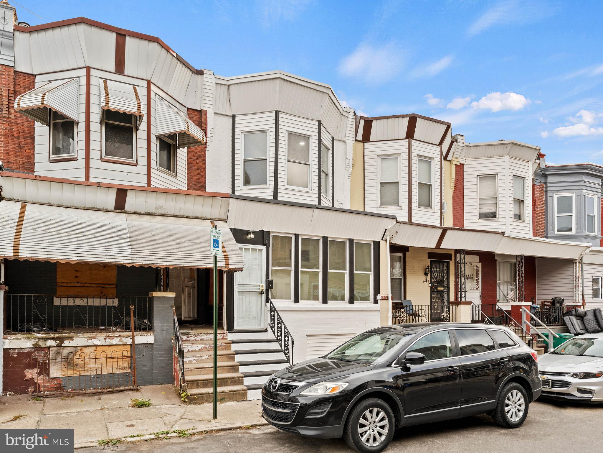5422 Regent Street Philadelphia, PA 19143 - Photo 3 of 35 a car parked in front of a building