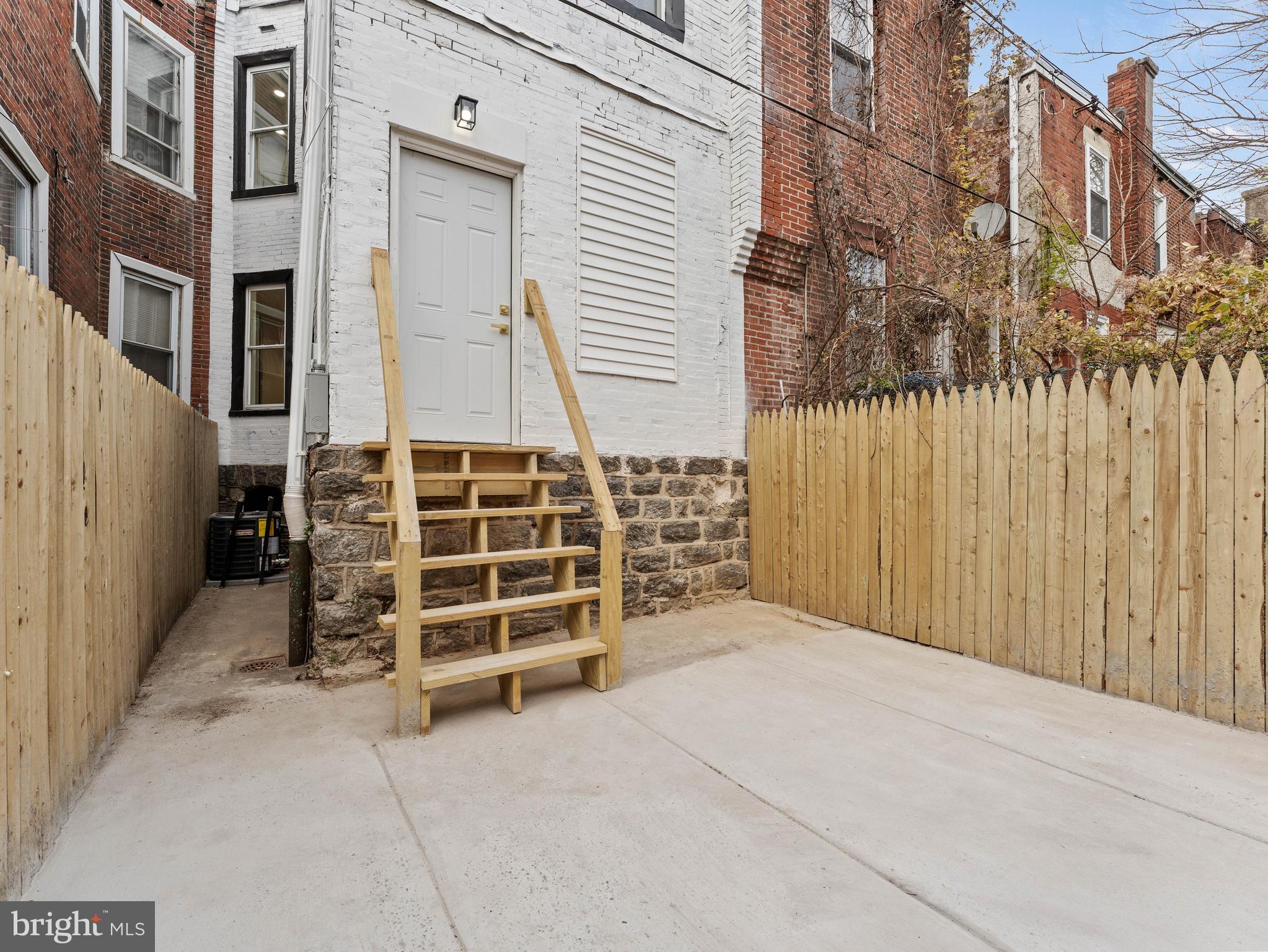 5422 Regent Street Philadelphia, PA 19143 - Photo 35 of 35 a view of a house with a door and a window