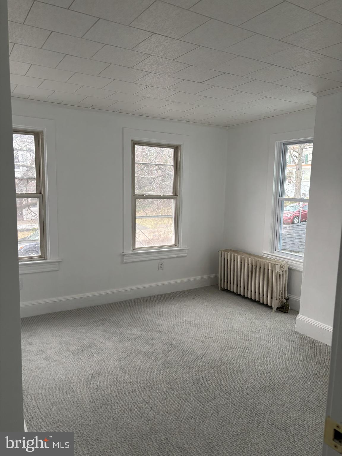 209 Main Street Hamilton, NJ 08620 - Photo 10 of 18 an empty room with a window