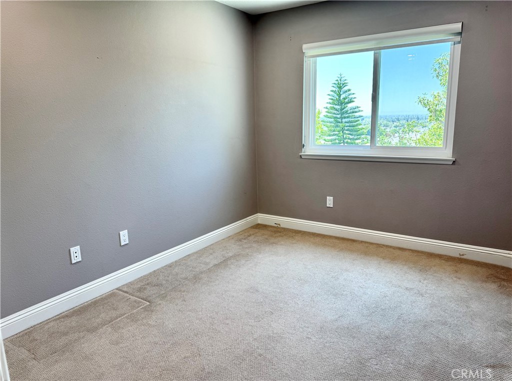 16073 Crestline Drive La Mirada, CA 90638 - Photo 23 of 75 a view of an empty room with a window