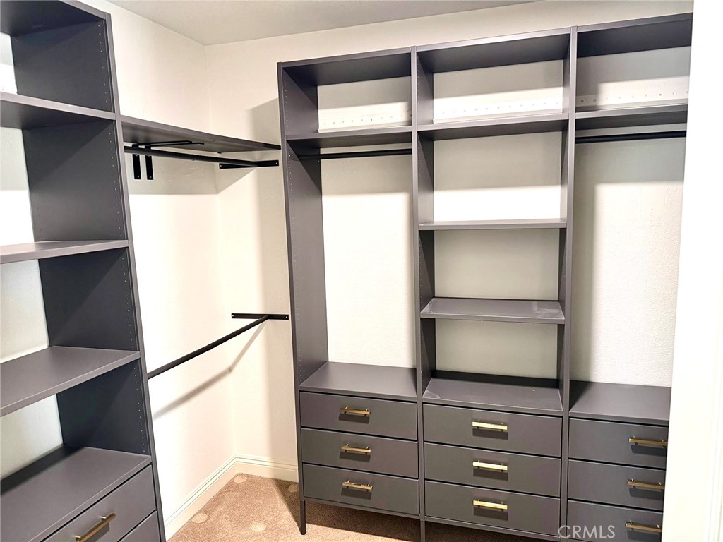 16073 Crestline Drive La Mirada, CA 90638 - Photo 32 of 75 a view of walk in closet with empty racks