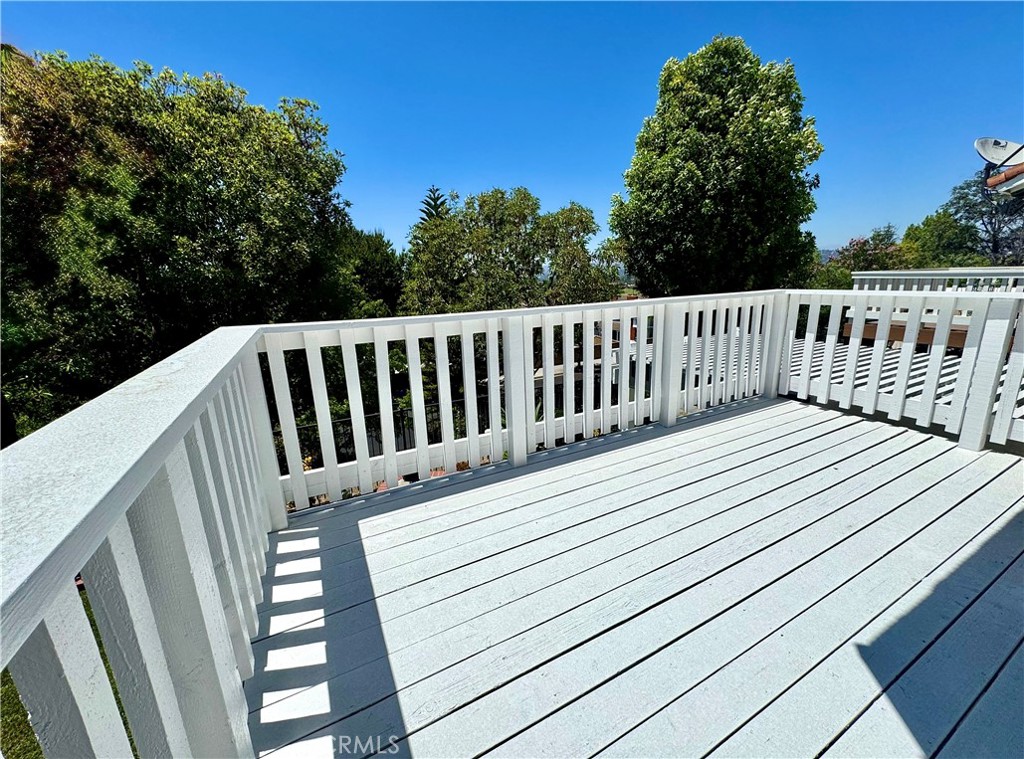 16073 Crestline Drive La Mirada, CA 90638 - Photo 38 of 75 a view of a wooden deck
