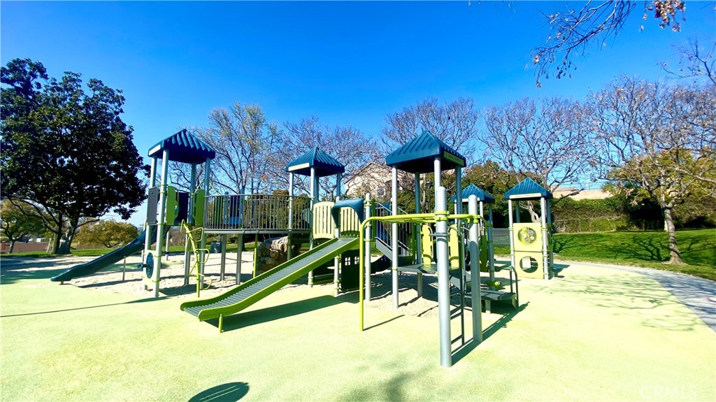 16073 Crestline Drive La Mirada, CA 90638 - Photo 49 of 75 a view of a park with swings and slides