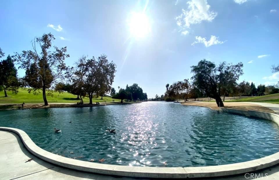 16073 Crestline Drive La Mirada, CA 90638 - Photo 63 of 75 a view of a swimming pool with an outdoor space and seating area