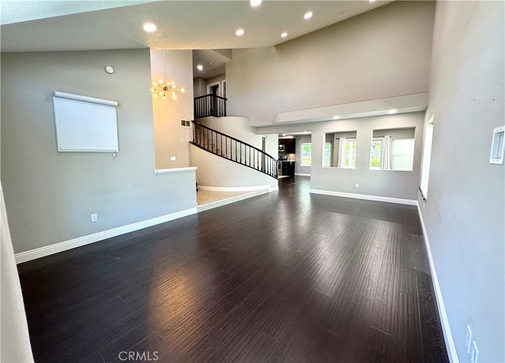 16073 Crestline Drive La Mirada, CA 90638 - Photo 9 of 75 a view of an entryway with wooden floor