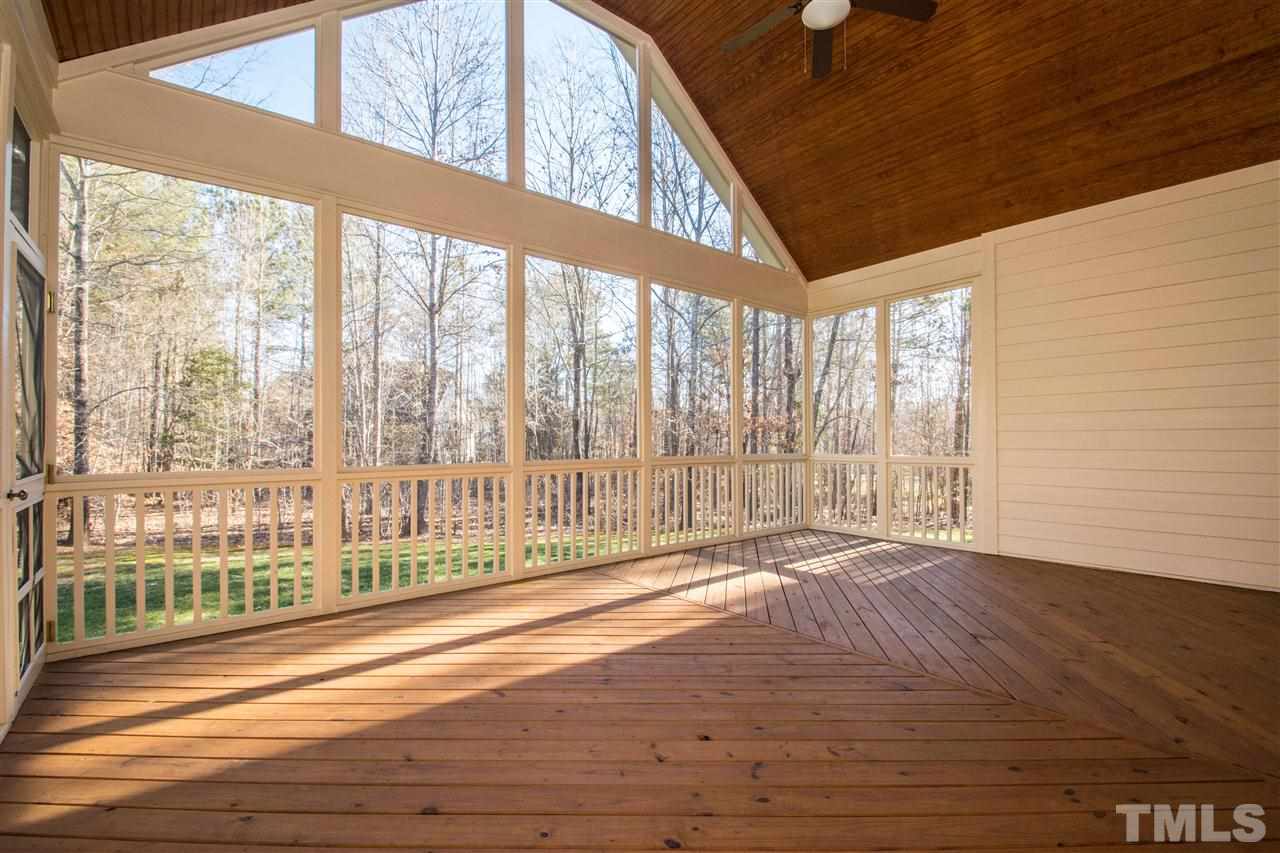 1068 Tacketts Pond Drive Raleigh, NC 27614 - Photo 22 of 25 Absolutely stunning two story screened porch. Enjoy all of the windows and natural lighting