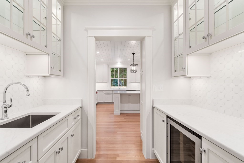 8 Hampshire Road Wellesley, MA 02481 - Photo 13 of 39 a kitchen with a sink cabinets and window