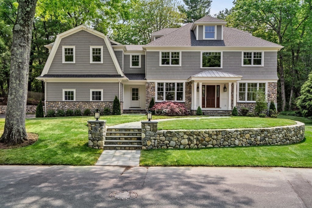 8 Hampshire Road Wellesley, MA 02481 - Photo 2 of 39 a front view of a house with a yard