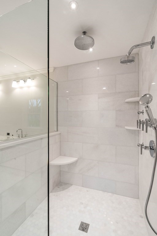 8 Hampshire Road Wellesley, MA 02481 - Photo 21 of 39 a bathroom with a shower and a bath tub