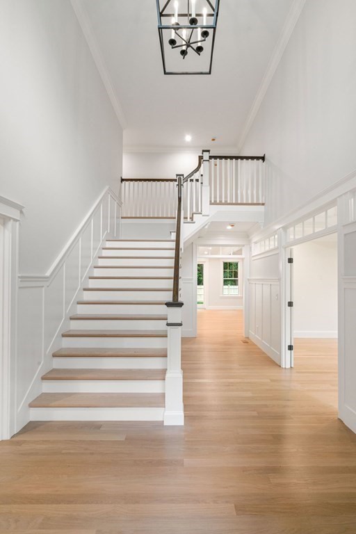 8 Hampshire Road Wellesley, MA 02481 - Photo 31 of 39 a view of entryway and hall with wooden floor