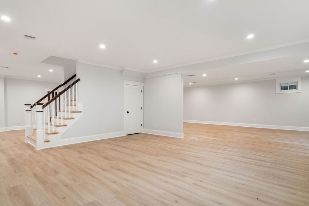 8 Hampshire Road Wellesley, MA 02481 - Photo 34 of 39 a view of empty room with wooden floor