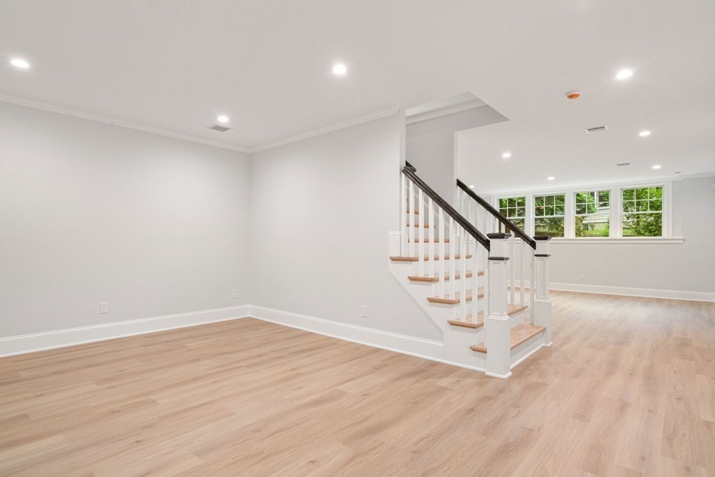 8 Hampshire Road Wellesley, MA 02481 - Photo 37 of 39 a view of entryway with stairs and wooden floor