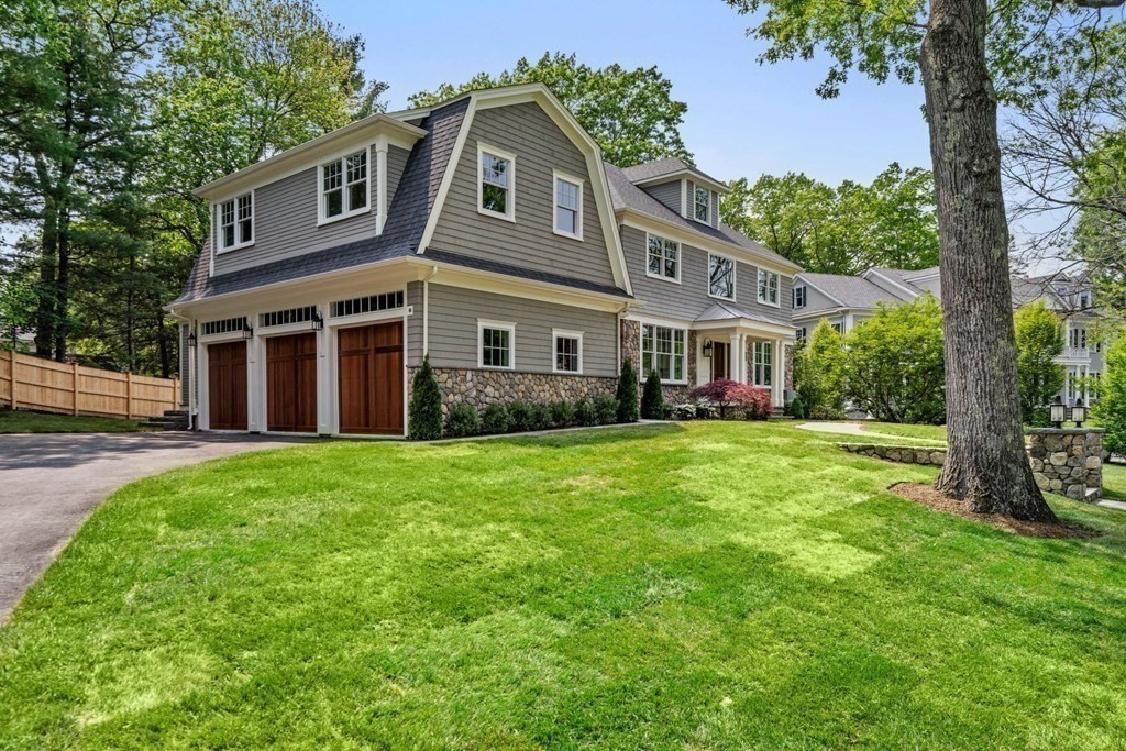8 Hampshire Road Wellesley, MA 02481 - Photo 5 of 39 a front view of a house with yard and green space