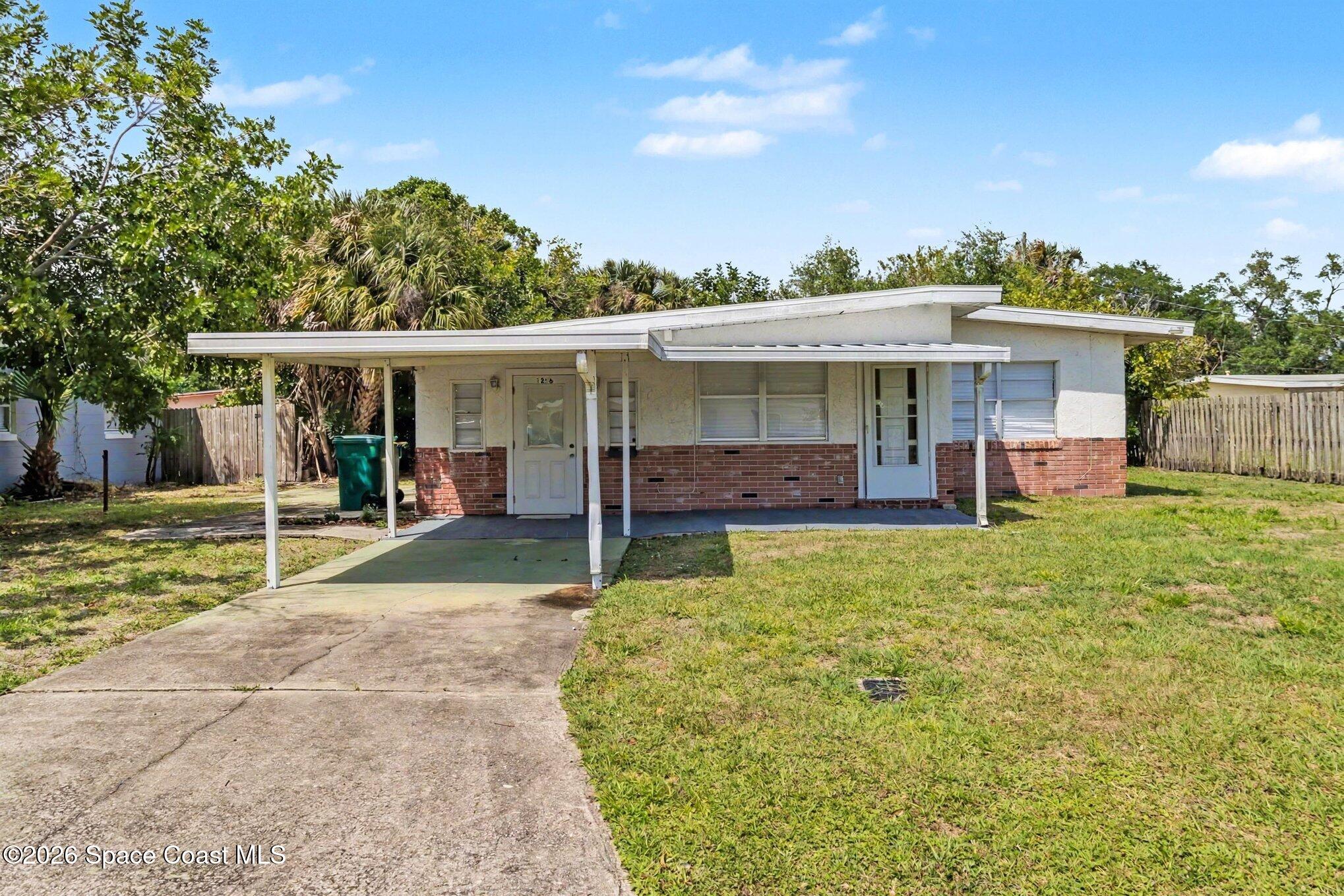 1256 Ridgewood Drive Melbourne, FL 32935 - Photo 4 of 41 004_file_9324