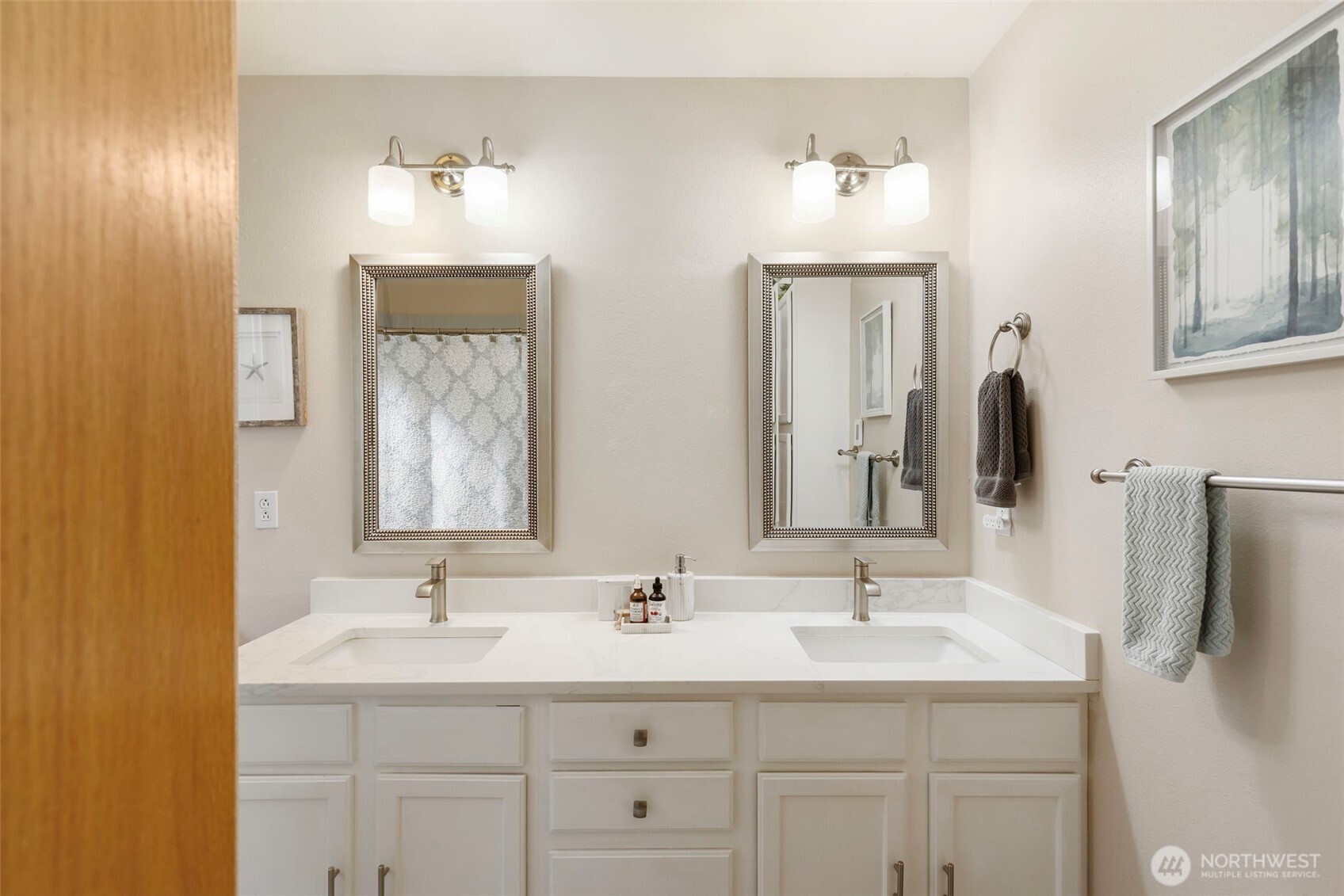 9240 Priddy Vista Road Northwest Seabeck, WA 98380 - Photo 17 of 40 a bathroom with double sink and a mirror