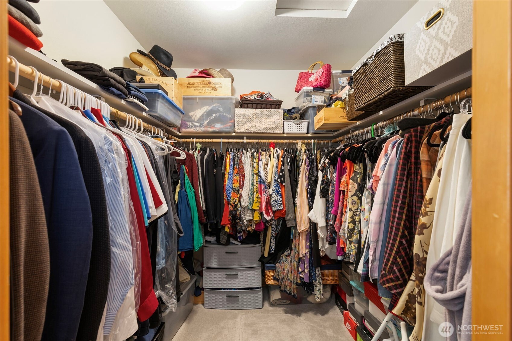9240 Priddy Vista Road Northwest Seabeck, WA 98380 - Photo 19 of 40 a view of walk in closet with clothes