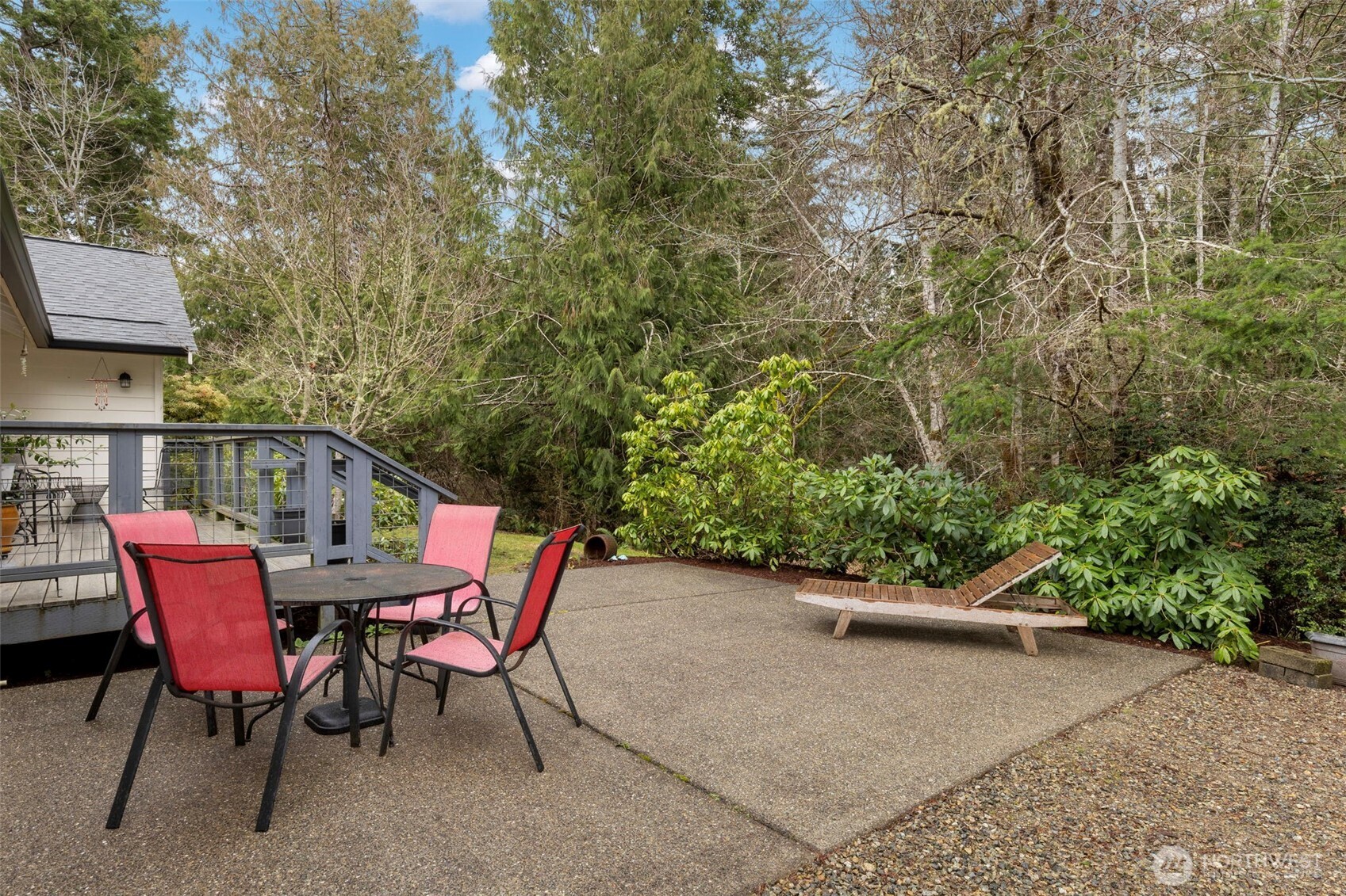 9240 Priddy Vista Road Northwest Seabeck, WA 98380 - Photo 27 of 40 a view of a chairs and table in the patio