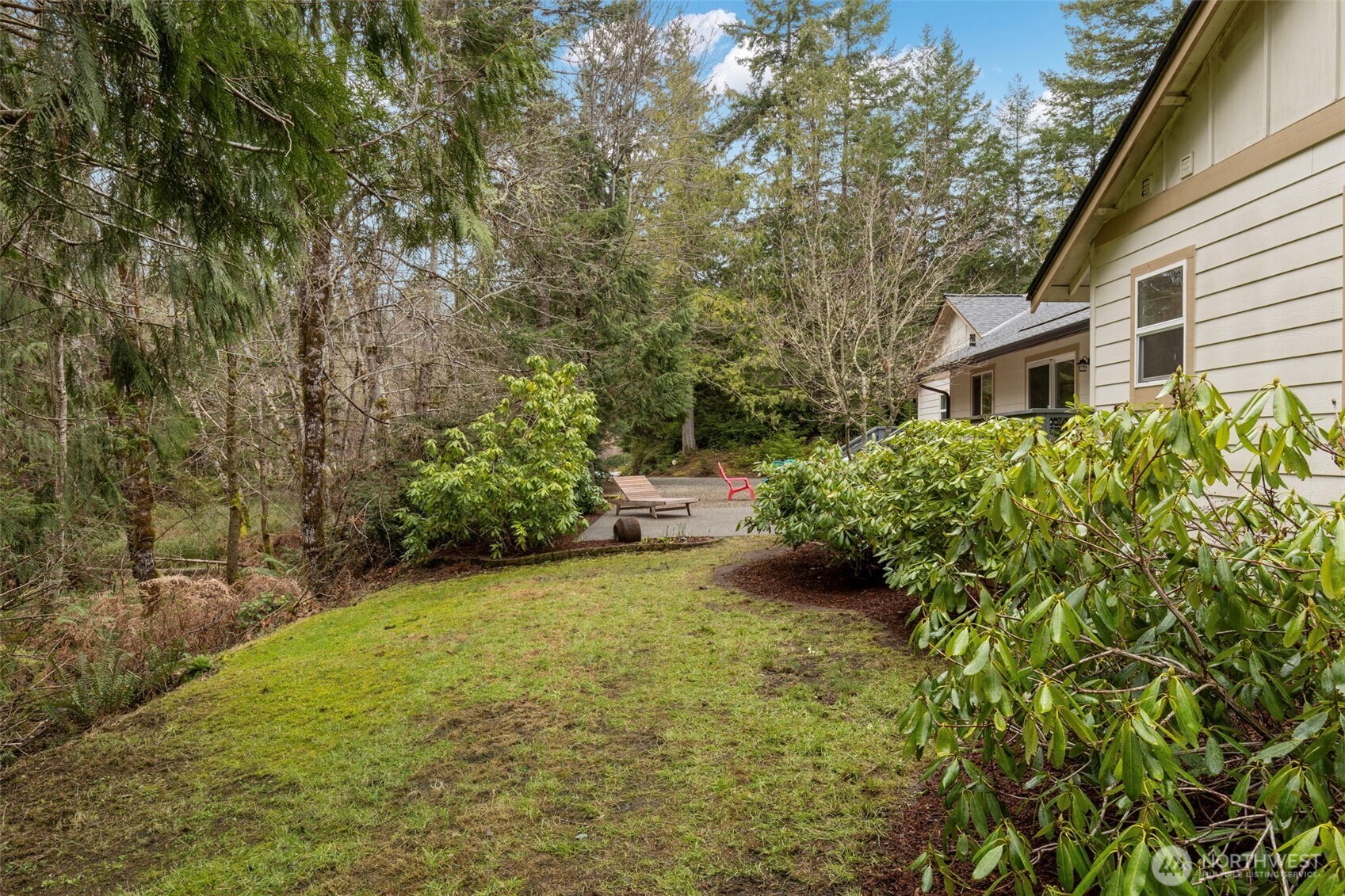 9240 Priddy Vista Road Northwest Seabeck, WA 98380 - Photo 31 of 40 a view of a back yard