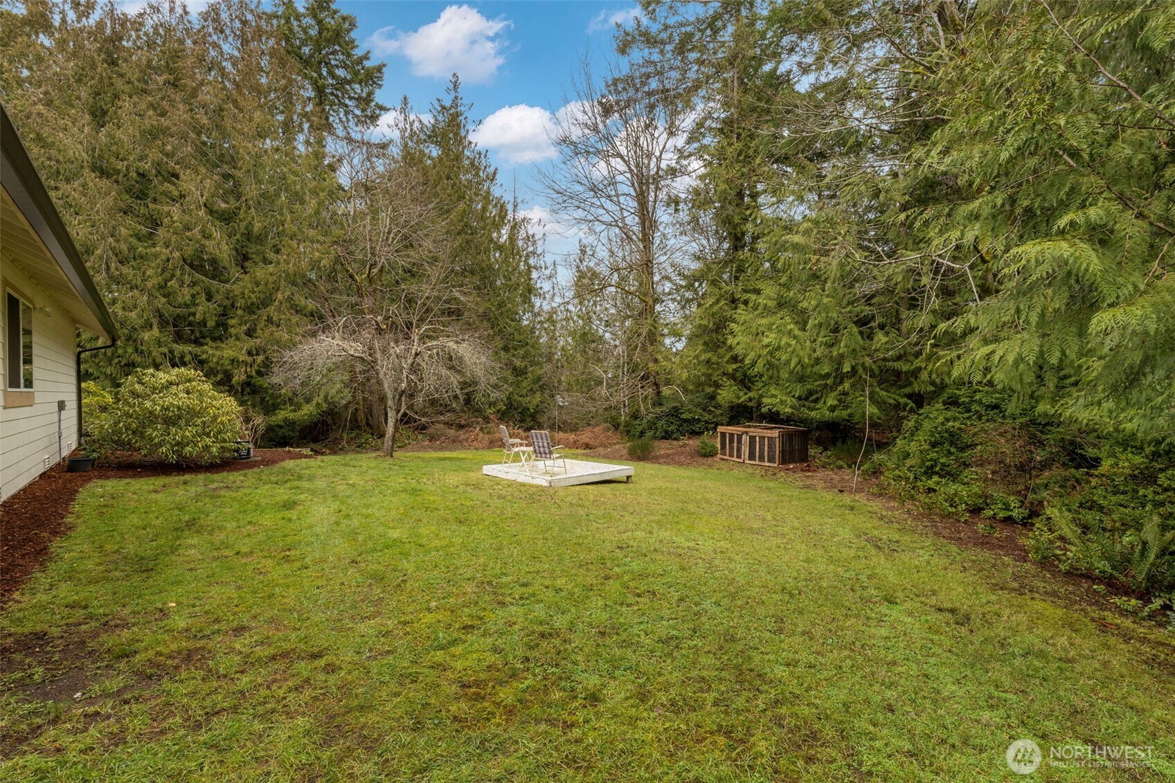 9240 Priddy Vista Road Northwest Seabeck, WA 98380 - Photo 32 of 40 a view of swimming pool with an outdoor space