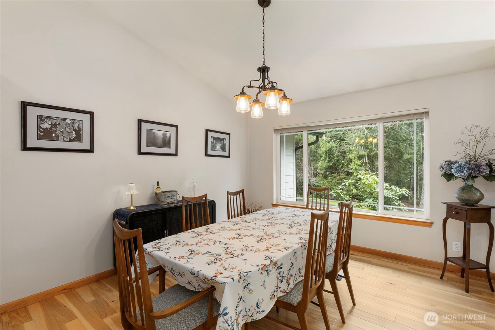 9240 Priddy Vista Road Northwest Seabeck, WA 98380 - Photo 5 of 40 a view of a dining room with furniture window and outside view