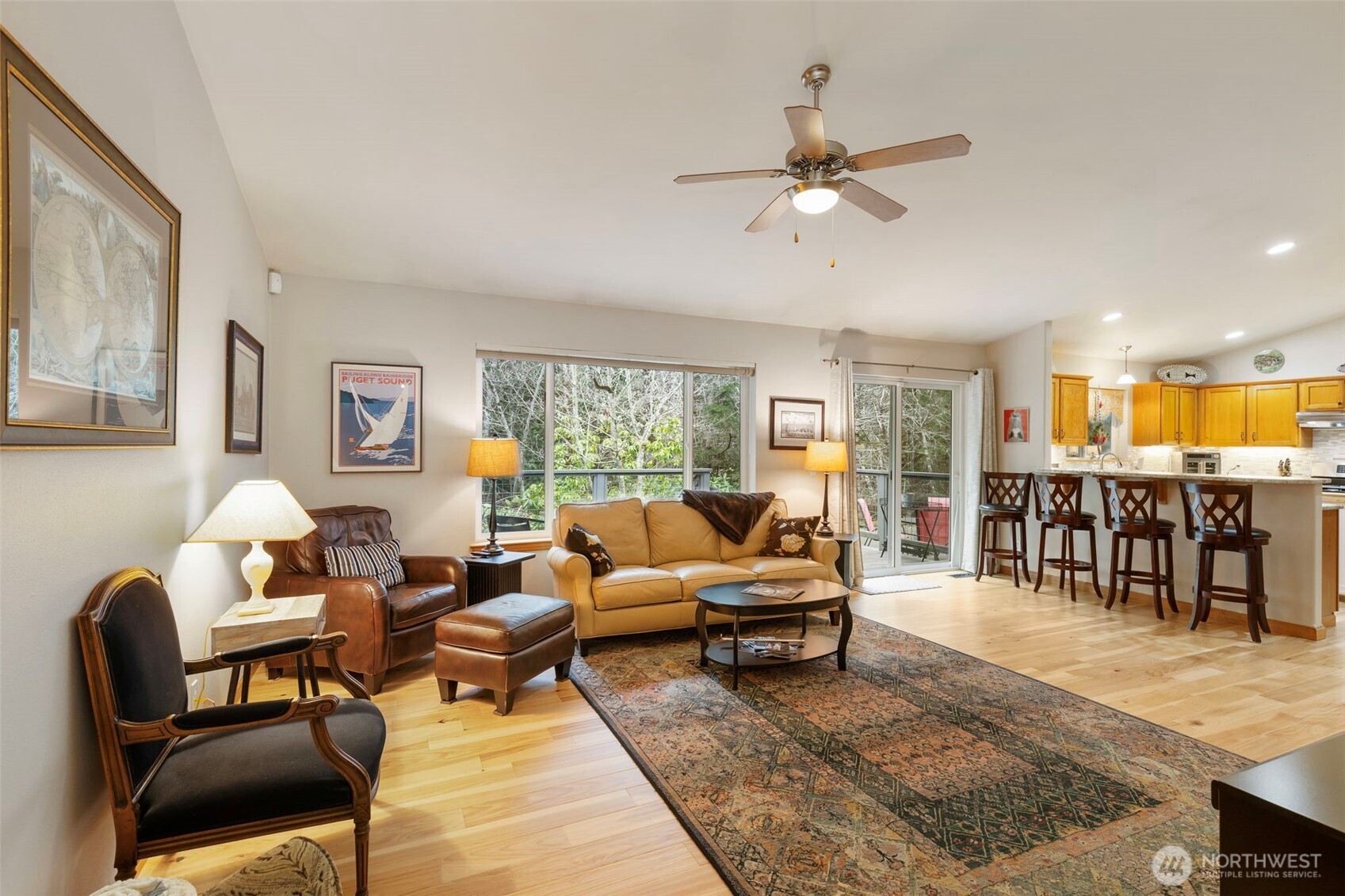 9240 Priddy Vista Road Northwest Seabeck, WA 98380 - Photo 6 of 40 a living room with furniture and a large window
