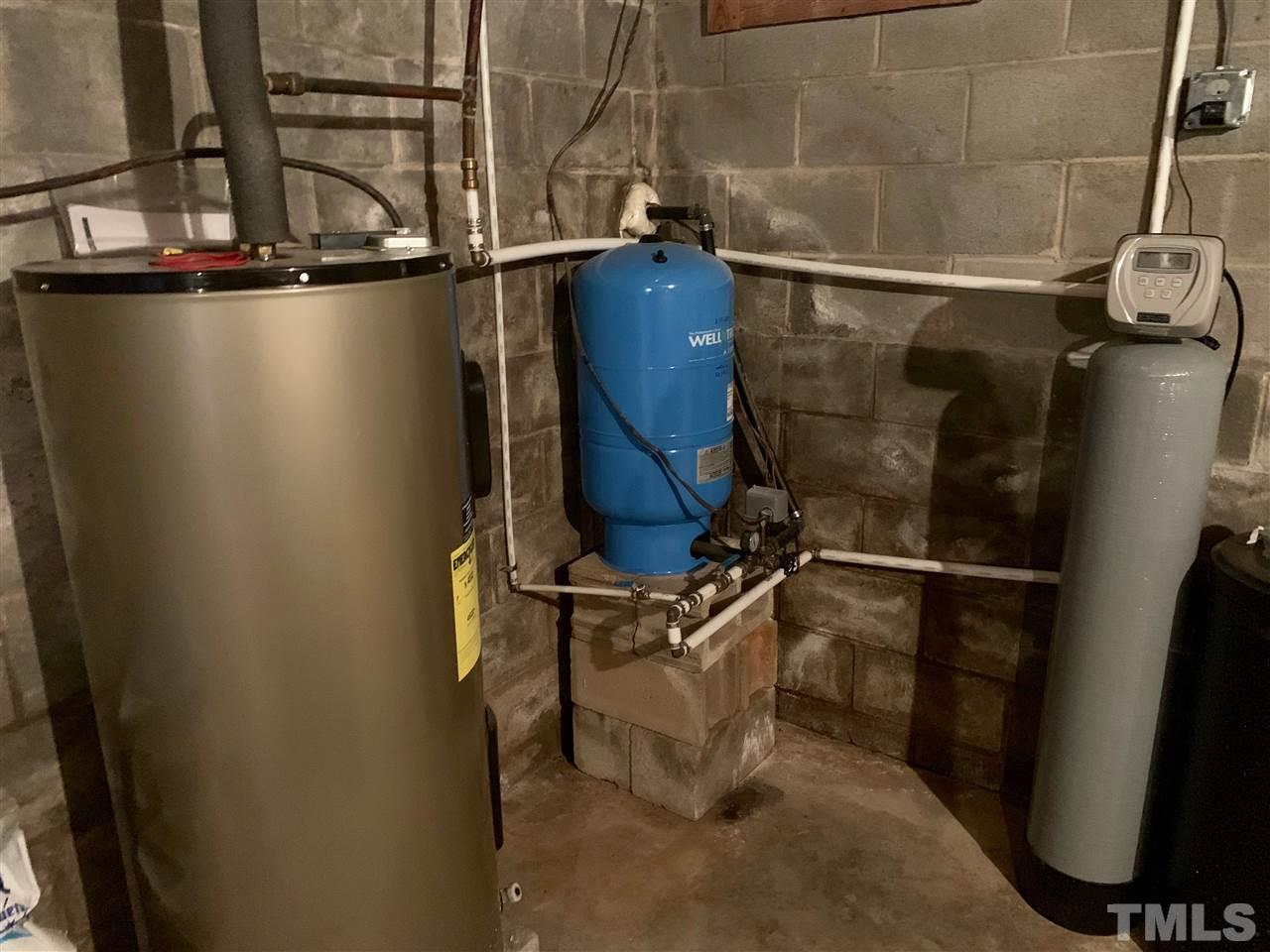 300 Thomas Humphries Road Roxboro, NC 27574 - Photo 18 of 22 New water heater and new water softener are located in the basement.