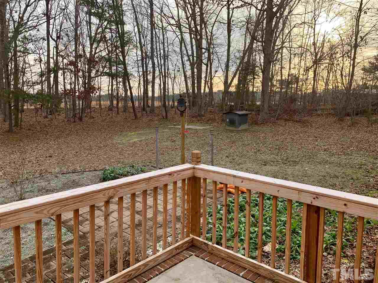 300 Thomas Humphries Road Roxboro, NC 27574 - Photo 22 of 22 Rear of lot is buffered with hardwood trees.