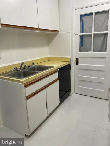 a utility room with washer and dryer