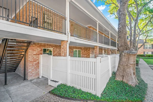 a front view of a house with a porch
