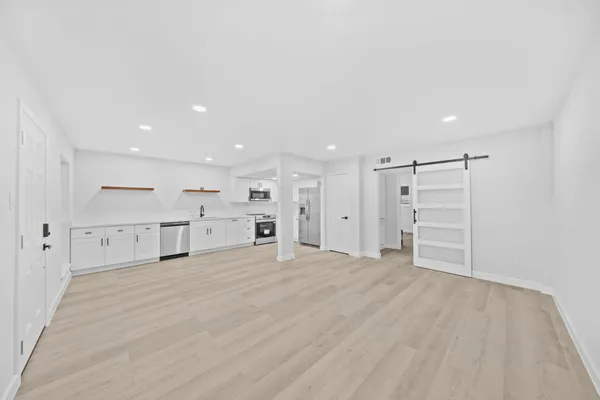 a view of a livingroom with a furniture