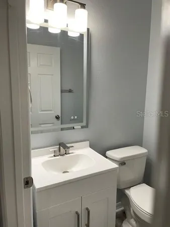 a bathroom with a sink and a toilet