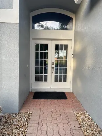 a view of a room with windows