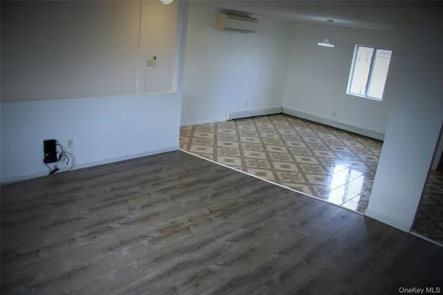 a view of an empty room and window