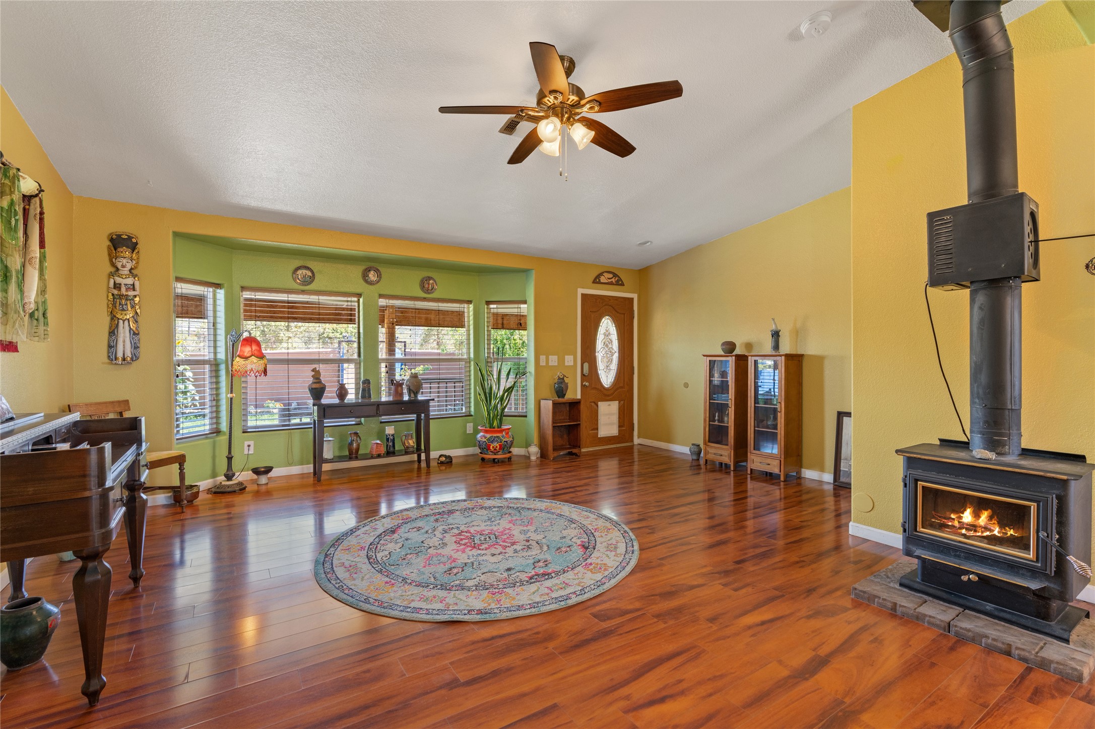 12 Apache Ridge Road Santa Fe, NM 87505 - Photo 8 of 69 Living area w/wood stove