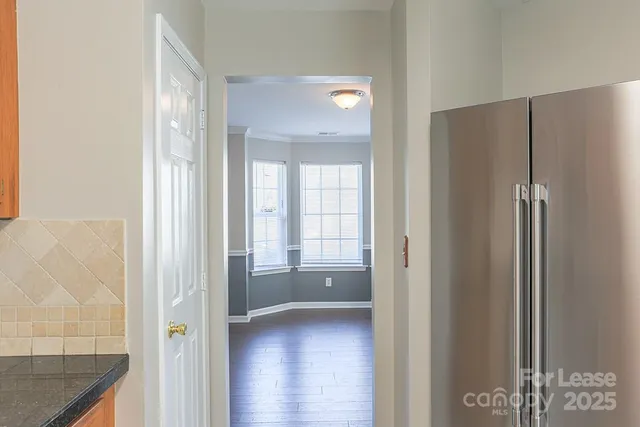 a view of a bathroom with a glass door