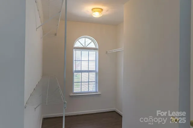 a view of a bathroom from a hallway