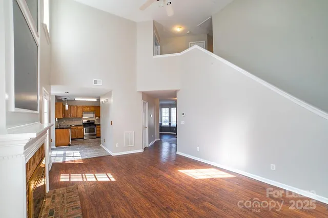a view of a livingroom with wooden floor