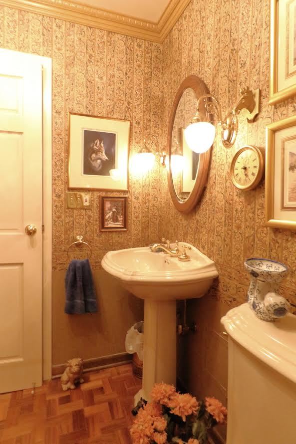 6033 North Sheridan Road, Unit 30A Chicago, IL 60660 - Photo 14 of 50 a bathroom with a sink a toilet and a mirror
