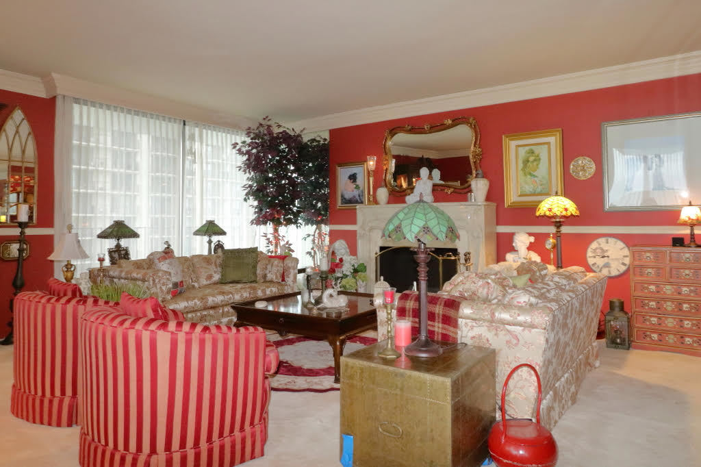 6033 North Sheridan Road, Unit 30A Chicago, IL 60660 - Photo 30 of 50 a living room filled with furniture chandelier and a fireplace