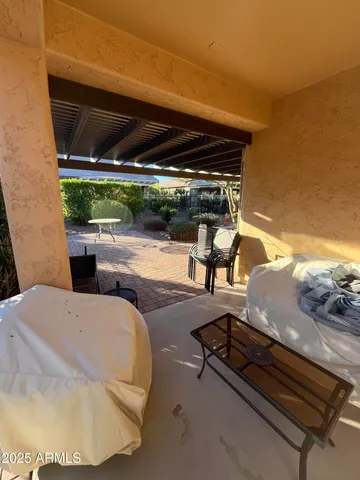 a view of a backyard with large tree