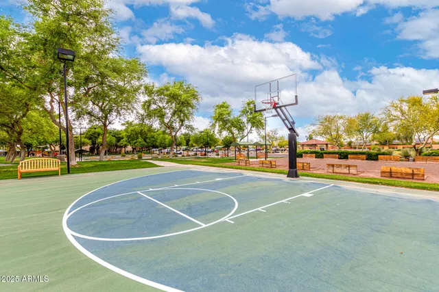 a view of swimming pool with outdoor seating