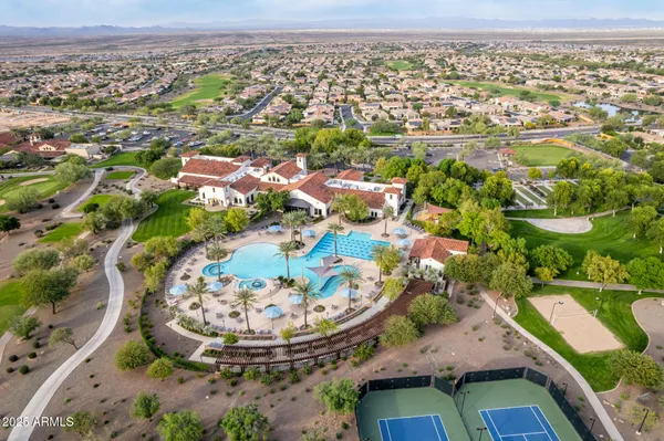 a view of a city with mountains in the background