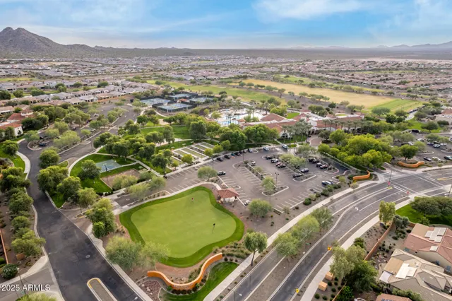 a view of an ocean with a mountain