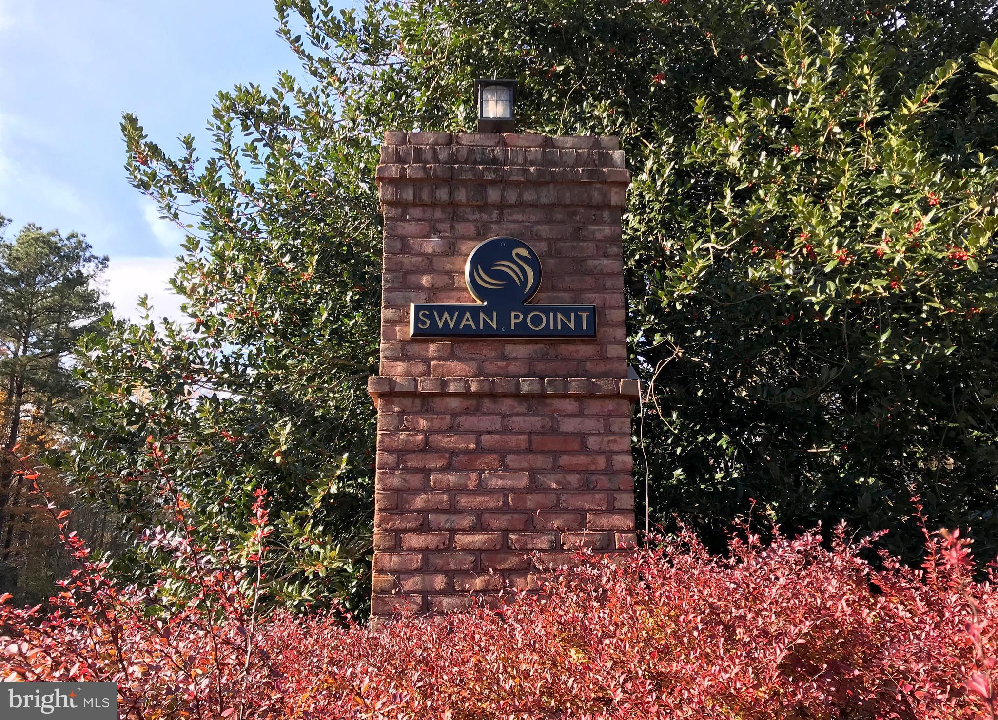 14975 Persimmon Court Issue, MD 20645 - Photo 7 of 15 a sign that is sitting in front of a tree