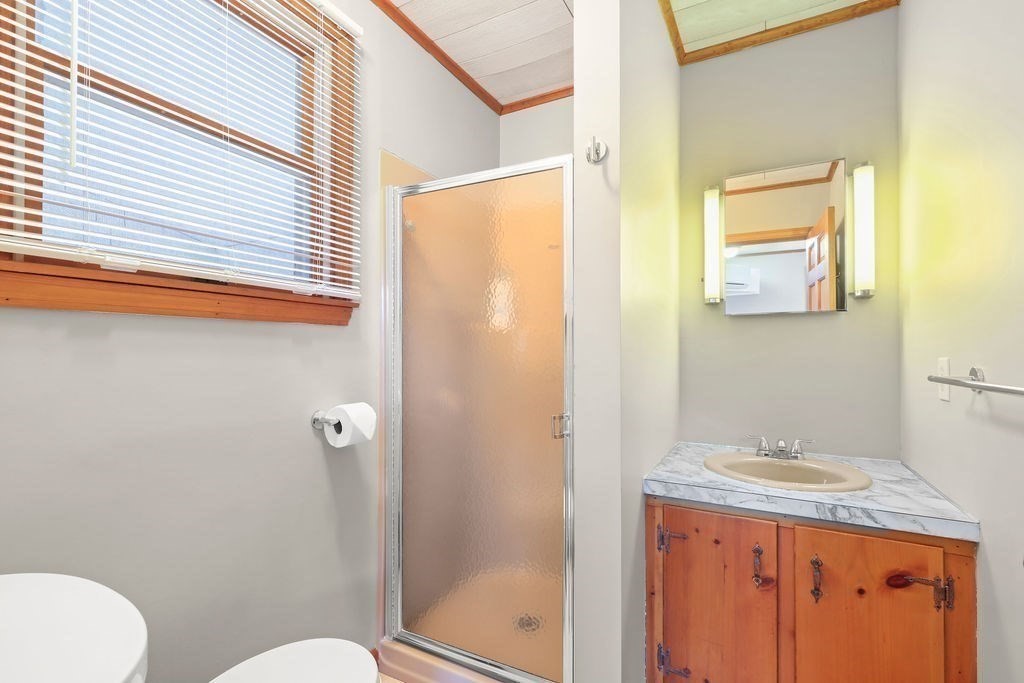 14 Salt Marsh Lane Wareham, MA 02571 - Photo 19 of 42 a bathroom with a granite countertop sink toilet and shower