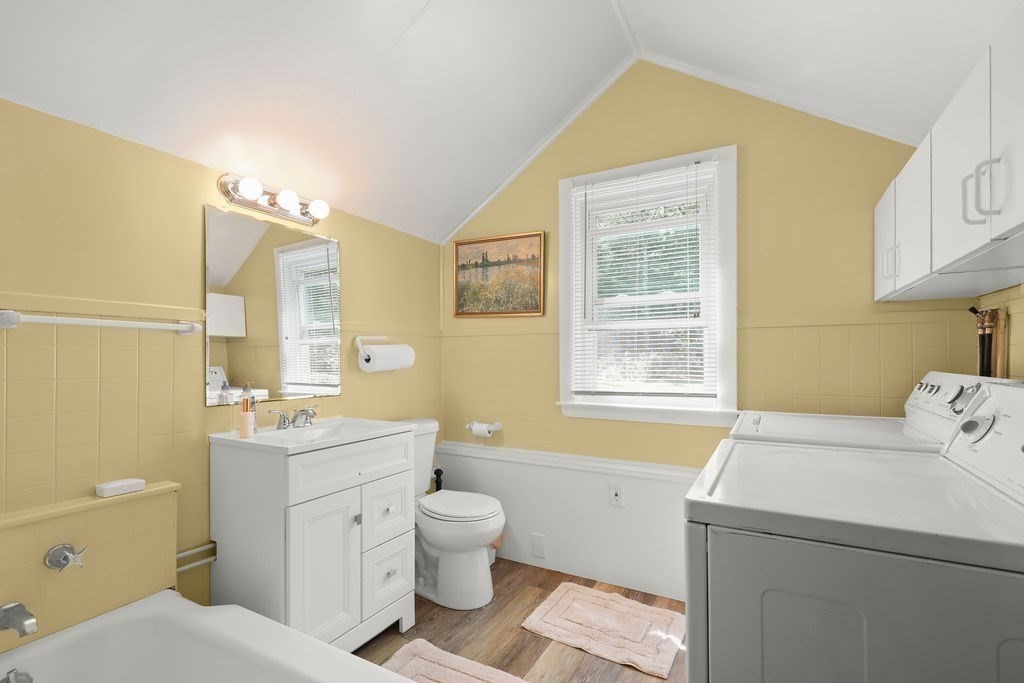 14 Salt Marsh Lane Wareham, MA 02571 - Photo 31 of 42 a bathroom with a sink toilet vanity and window
