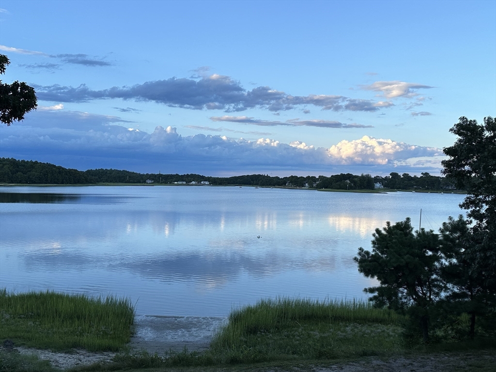 14 Salt Marsh Lane Wareham, MA 02571 - Photo 37 of 42 a view of a lake with sunset view